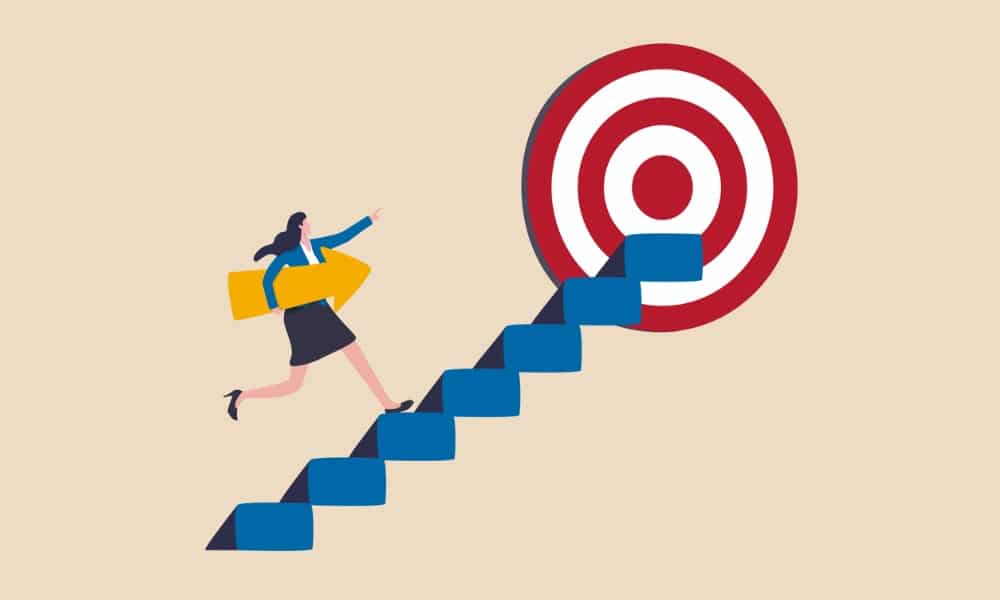 An illustration depicting a businesswoman running upstairs toward a bull’s eye as she works to achieve her goals.